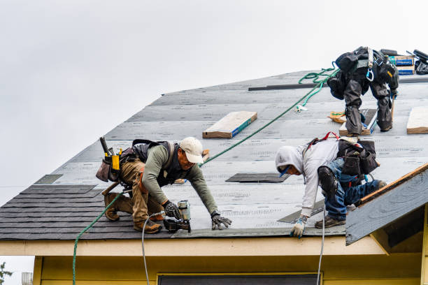 Professional Gutter Installation technician working in Summitville, IN